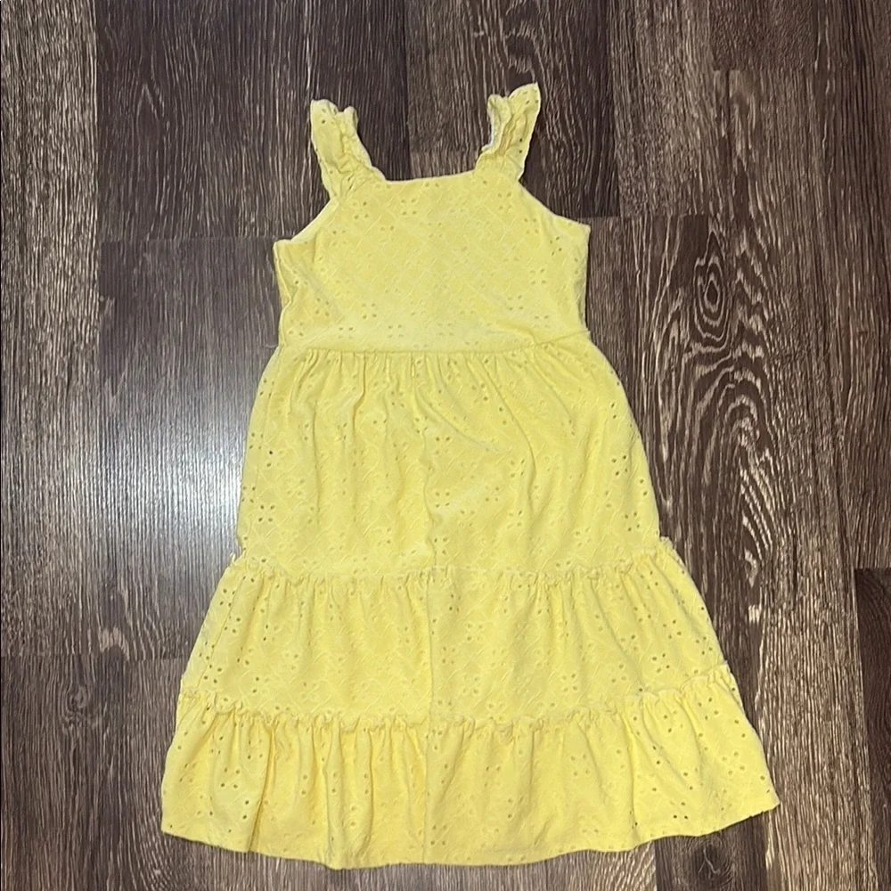 Girls bright yellow dress size 7 with buttons down the back, super cute!!